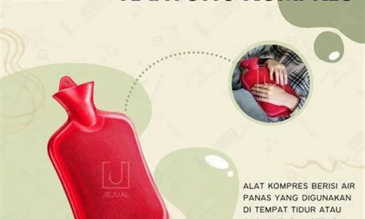 Terapi Kompres Hangat Seseorang menggunakan kompres hangat pada perut