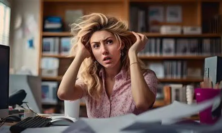 Seorang wanita merasa kewalahan karena beban kerja berlebih