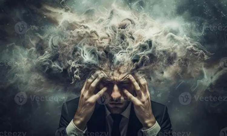 Pria yang mengalami overthinking di depan meja kerja