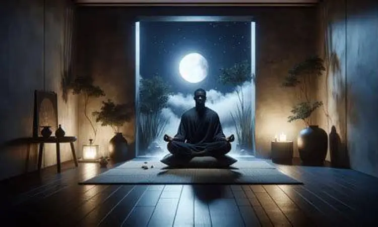 Seseorang melakukan meditasi sebelum tidur untuk kualitas mimpi yang lebih baik