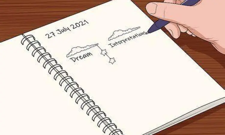 Seseorang sedang menulis di buku catatan di pagi hari